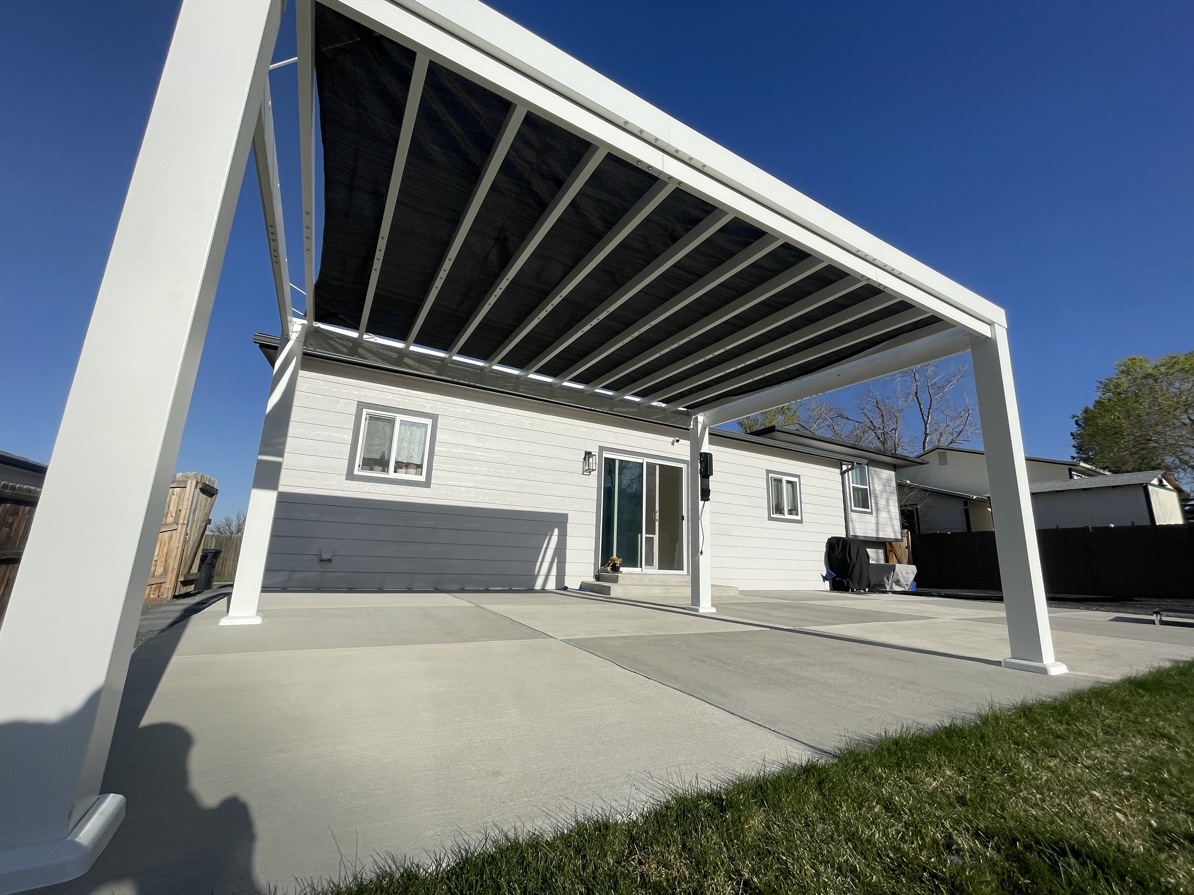 Modern louvered pergola with sleek white finish